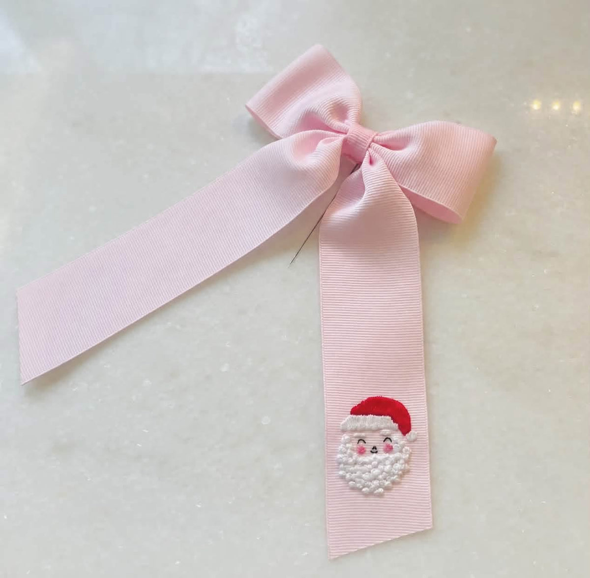 Hand-embroidered Santa hair bow